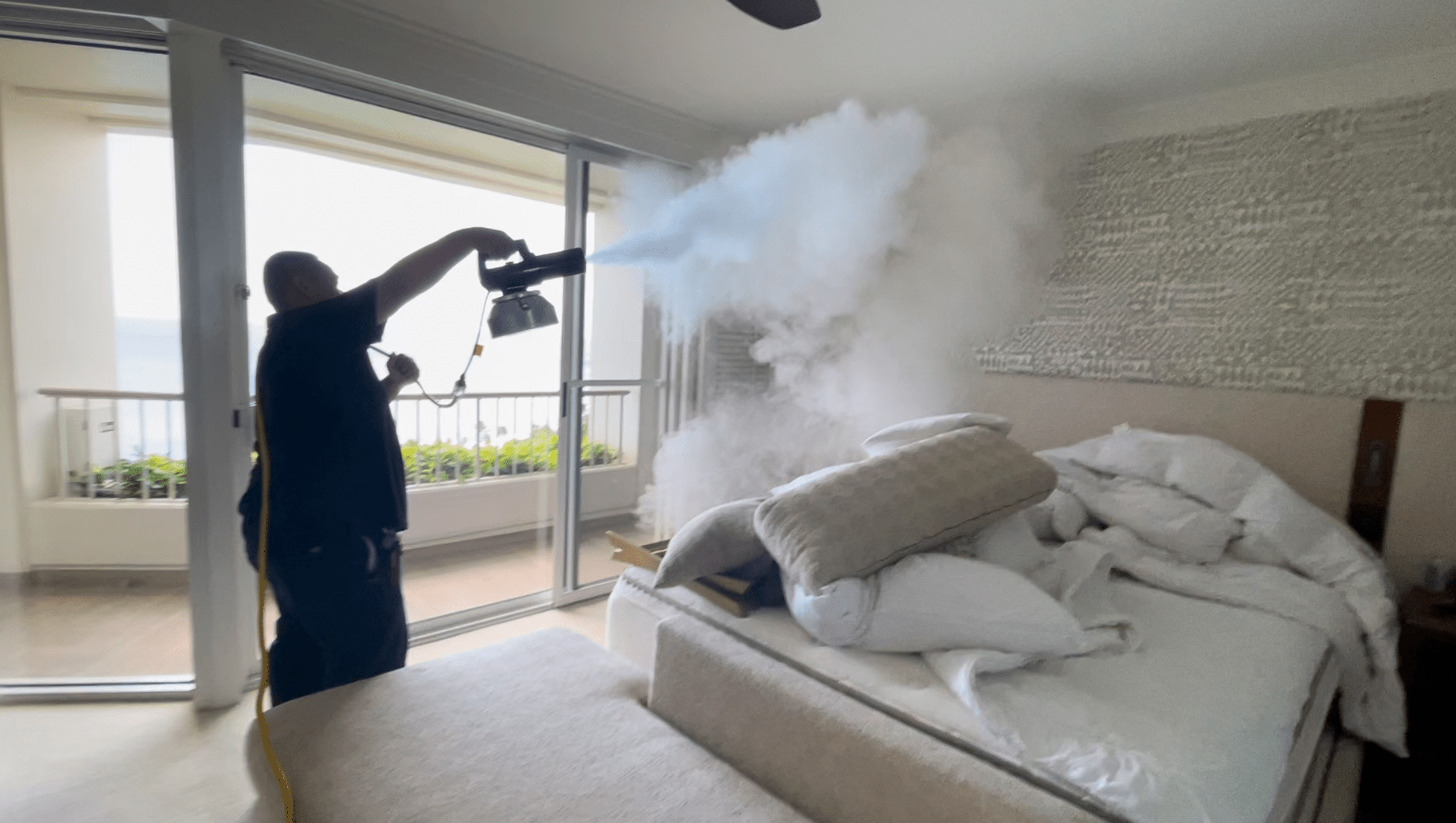 Renue technician using an odor eliminating fogger at a luxury resort